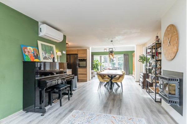 Foto - Verkocht: Ruime instapklare geschakelde 2 onder 1 kap woning voorzien van een goed isolatiepakket met aanbouw, bijkeuken, ruime tuin op zuiden (ca 131 m2) en garage gelegen in Kunrade.